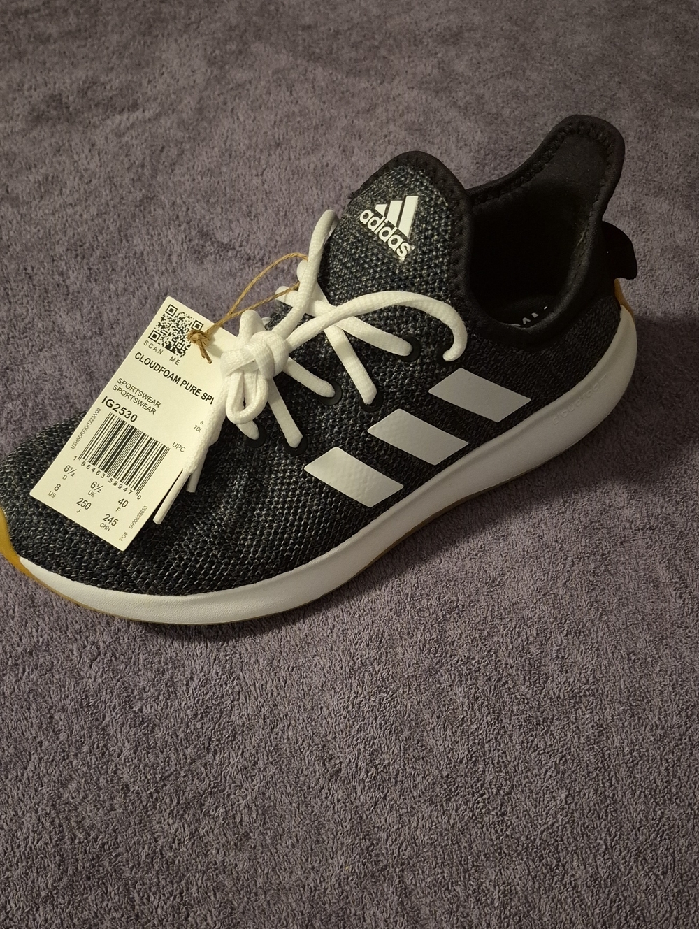 adidas Womens Black and White Slip-On Sneaker